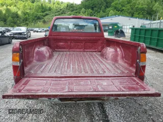 1999 Toyota Tacoma z VIN 4TANL42N4XZ435246, wystawiony jako Copart lot #56843025 z przebiegiem 197 295 mil mil oraz Szkoda całkowita • Salvage title. Historia ofert i sprzedaży dostępna na DreamBid. Obrazek 10.