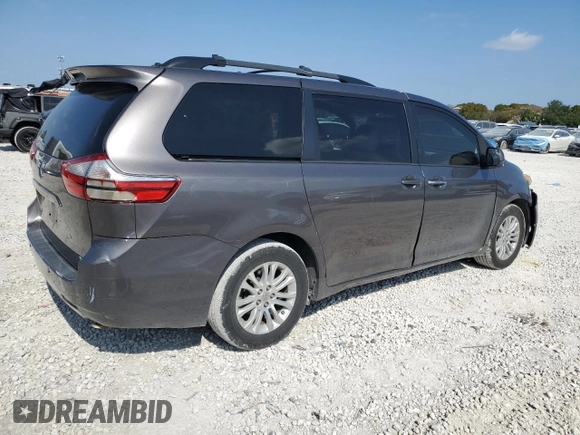 2015 Toyota Sienna XLE with VIN 5TDYK3DCXFS672544, listed as a Copart auction lot 52135735 with 181,780 mi miles and Salvage Title. Bid and sale history available at carsss.com. Image 3.