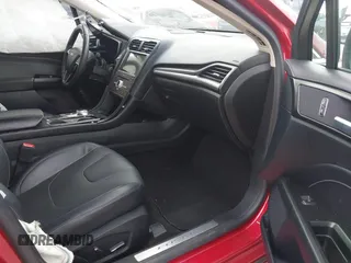 2020 Ford Fusion Hybrid Titanium with VIN 3FA6P0RU7LR156915, listed as a IAAI auction lot 40738652 with 82,836 mi miles. Bid and sale history available at carsss.com. Image 5.