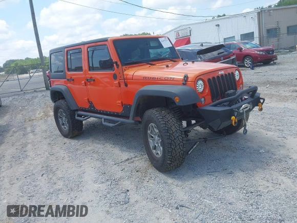 2015 Jeep Wrangler Unlimited Rubicon z VIN 1C4BJWFG4FL598033, wystawiony jako IAAI lot #42435523 z przebiegiem 134 202 mil mil oraz . Historia ofert i sprzedaży dostępna na DreamBid. Obrazek 1.