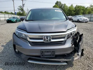 2019 Honda Pilot EX-L with VIN 5FNYF6H54KB052448, listed as a Copart auction lot 60498925 with 146,113 mi miles and Salvage title. Bid and sale history available at DreamBid. Image 5.