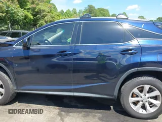 2016 Lexus RX 350 with VIN JTJBZMCA2G2001429, listed as a IAAI auction lot 42202436 with Not provided miles and . Bid and sale history available at DreamBid. Image 14.