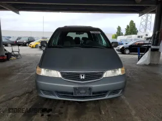2000 Honda Odyssey EX с VIN 2HKRL1867YH555314, выставлен на аукционе Copart как лот 61065505 с пробегом 165 993 миль миль и Списание • Salvage title. История ставок и продаж доступна на DreamBid. Изображение 5.