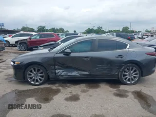 2021 Mazda 3 Preferred with VIN 3MZBPACL6MM252531, listed as a IAAI auction lot 42145811 with 35,869 mi miles and . Bid and sale history available at DreamBid. Image 13.