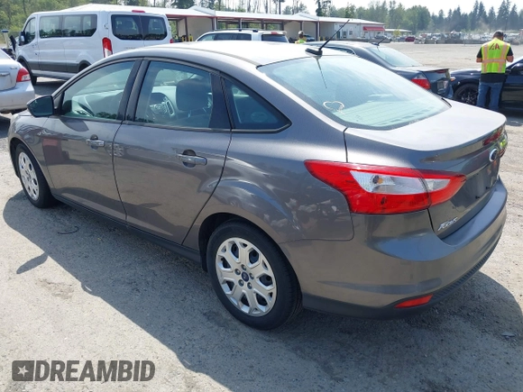 2012 Ford Focus SE with VIN 1FAHP3F25CL260962, listed as a IAAI auction lot 42588485 with 143,679 mi miles and . Bid and sale history available at DreamBid. Image 3.