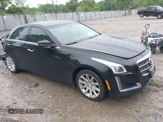2014 Cadillac CTS AWD z VIN 1G6AW5SX4E0129136, wystawiony jako IAAI lot #42364098 z przebiegiem 137 080 mil mil oraz . Historia ofert i sprzedaży dostępna na DreamBid. Obrazek 1.