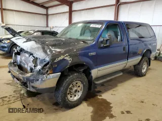 1999 Ford Super Duty F-250 XL with VIN 1FTNF21F2XEB09589, listed as a Copart auction lot 50700795 with 292,135 mi miles and Salvage Title. Bid and sale history available at carsss.com. Image 1.