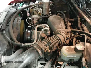 2002 Chevrolet Blazer LS z VIN 1GNDT13W02K213365, wystawiony jako IAAI lot #42561803 z przebiegiem 112 894 mil mil oraz . Historia ofert i sprzedaży dostępna na DreamBid. Obrazek 20.