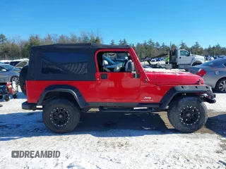 2005 Jeep Wrangler Unlimited with VIN 1J4FA44S05P375941, listed as a IAAI auction lot 41420299 with 138,859 mi miles. Bid and sale history available at carsss.com. Image 13.
