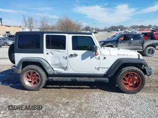 2016 Jeep Wrangler Unlimited Rubicon Hard Rock with VIN 1C4HJWFG9GL296782, listed as a IAAI auction lot 41595273 with 113,338 mi miles. Bid and sale history available at carsss.com. Image 13.