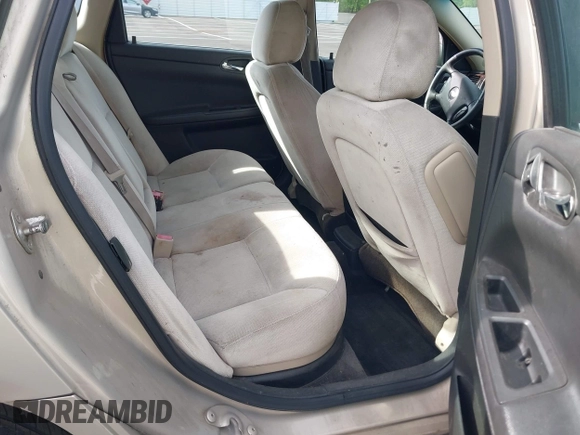 2012 Chevrolet Impala LT Retail with VIN 2G1WB5E3XC1120653, listed as a IAAI auction lot 42083097 with 220,392 mi miles and . Bid and sale history available at DreamBid. Image 8.