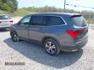 2018 Honda Pilot EX-L with VIN 5FNYF6H52JB066721, listed as a IAAI auction lot 42052842 with 134,393 mi miles and . Bid and sale history available at DreamBid. Image 3.
