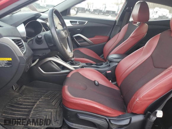 2012 Hyundai Veloster w/Gray Int with VIN KMHTC6AD6CU077585, listed as a Copart auction lot 84170474 with 101,723 mi miles and Salvage title. Bid and sale history available at DreamBid. Image 7.