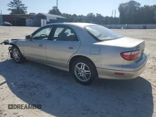1999 Mazda Millenia z VIN JM1TA2217X1502746, wystawiony jako Copart lot #72165894 z przebiegiem 196 957 mil mil oraz Szkody całkowita. Historia ofert i sprzedaży dostępna na DreamBid. Obrazek 2.