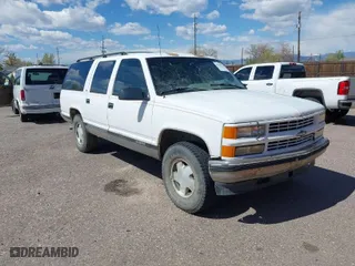 1996 Chevrolet Suburban with VIN 1GNFK16R9TJ411712, listed as a IAAI auction lot 42070739 with 242,044 mi miles. Bid and sale history available at carsss.com. Image 1.