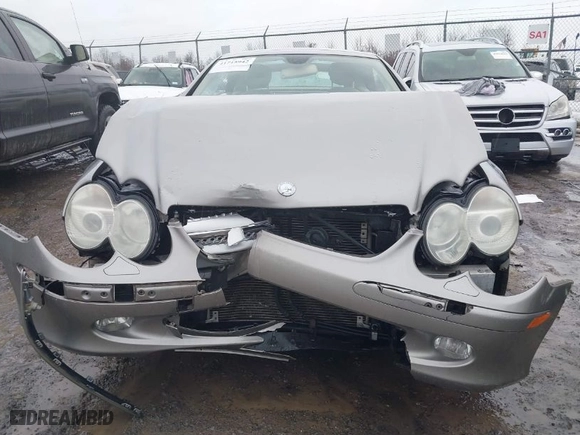 2005 Mercedes-Benz SL-Class 5.0L with VIN WDBSK75F35F099084, listed as a IAAI auction lot 41715942 with 114,880 mi miles. Bid and sale history available at carsss.com. Image 12.