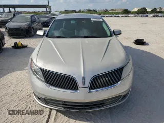 2013 Lincoln MKS EcoBoost with VIN 1LNHL9FT4DG617152, listed as a Copart auction lot 53295465 with 167,828 mi miles and Clean Title. Bid and sale history available at carsss.com. Image 5.
