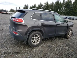 2014 Jeep Cherokee Altitude with VIN 1C4PJMCB1EW241229, listed as a Copart auction lot 84825234 with 179,361 mi miles and Salvage Title. Bid and sale history available at carsss.com. Image 3.