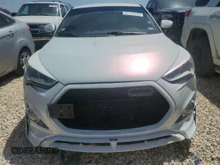 2016 Hyundai Veloster Turbo z VIN KMHTC6AEXGU261247, wystawiony jako Copart lot #52240215 z przebiegiem 137 238 mil mil oraz Czysty tytuł • Clean title. Historia ofert i sprzedaży dostępna na DreamBid. Obrazek 5.