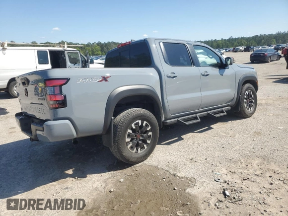 2022 Nissan Frontier Pro-X с VIN 1N6ED1EJ5NN679157, выставлен на аукционе Copart как лот 51935295 с пробегом 38 648 миль миль и Списание • Salvage title. История ставок и продаж доступна на DreamBid. Изображение 3.