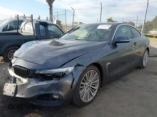 2014 BMW 4 Series 428i with VIN WBA3N7C5XEF719384, listed as a IAAI auction lot 41694678 with 115,517 mi miles and . Bid and sale history available at carsss.com. Image 17.