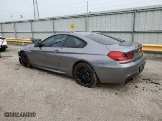 2013 BMW 6 Series 650i xDrive with VIN WBAYM1C53DDZ02397, listed as a Copart auction lot 48872655 with 0 mi miles and Salvage Title. Bid and sale history available at carsss.com. Image 2.