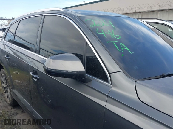 2017 Audi Q7 Premium with VIN WA1AAAF71HD010675, listed as a IAAI auction lot 41956959 with 136,549 mi miles and . Bid and sale history available at DreamBid. Image 14.