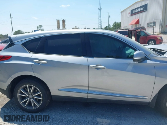 2019 Acura RDX Technology with VIN 5J8TC2H56KL028081, listed as a IAAI auction lot 40042142 with 76,899 mi miles and . Bid and sale history available at DreamBid. Image 14.