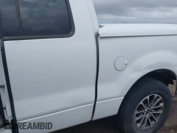 2004 Ford F-150 XLT with VIN 1FTRX12594KD71332, listed as a IAAI auction lot 42138488 with 170,234 mi miles. Bid and sale history available at carsss.com. Image 6.