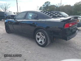 2012 Dodge Charger Police z VIN 2C3CDXAT6CH305154, wystawiony jako IAAI lot #41366892 z przebiegiem 155 824 mil mil oraz . Historia ofert i sprzedaży dostępna na DreamBid. Obrazek 3.