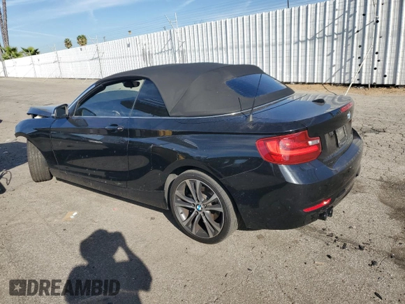 2015 BMW 2 Series 228i with VIN WBA1K5C59FV242992, listed as a Copart auction lot 75433654 with Not provided miles and Salvage title. Bid and sale history available at DreamBid. Image 2.