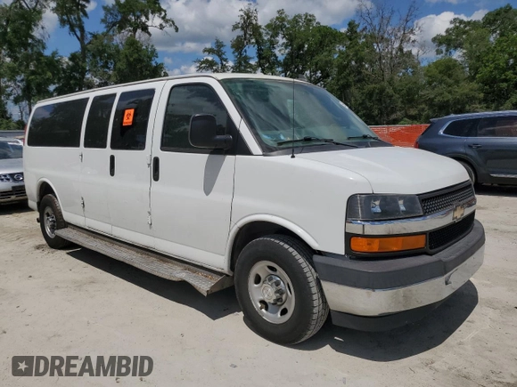 2017 Chevrolet Express Passenger LT with VIN 1GAZGPFG2H1180404, listed as a Copart auction lot 56962715 with 89,706 mi miles and Salvage title. Bid and sale history available at DreamBid. Image 4.
