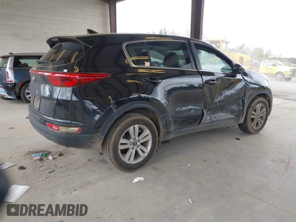 2018 Kia Sportage LX with VIN KNDPM3AC7J7463078, listed as a IAAI auction lot 42086356 with 75,406 mi miles and . Bid and sale history available at carsss.com. Image 4.