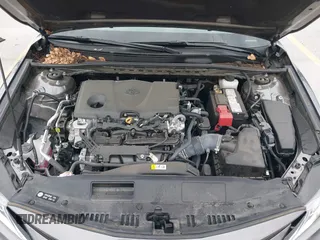 2023 Toyota Camry LE z VIN 4T1R11AK1PU169839, wystawiony jako IAAI lot #42140135 z przebiegiem 10 808 mil mil oraz . Historia ofert i sprzedaży dostępna na DreamBid. Obrazek 10.