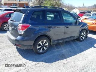 2018 Subaru Forester Premium with VIN JF2SJAGC4JH615487, listed as a IAAI auction lot 41854410 with 320,094 mi miles. Bid and sale history available at carsss.com. Image 4.