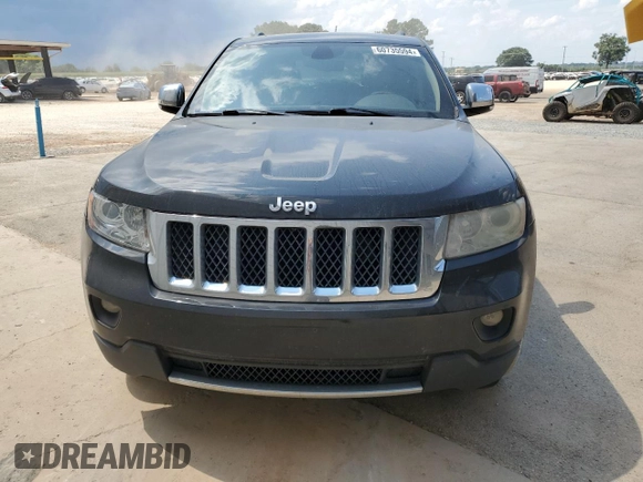 2013 Jeep Grand Cherokee Overland with VIN 1C4RJECT7DC526119, listed as a Copart auction lot 60735594 with 143,454 mi miles and Clean Title. Bid and sale history available at carsss.com. Image 5.