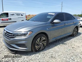 2019 Volkswagen Jetta SEL Premium с VIN 3VWGB7BU8KM133538, выставлен на аукционе Copart как лот 50101564 с пробегом 53 901 миль миль и Списание • Salvage title. История ставок и продаж доступна на DreamBid. Изображение 1.