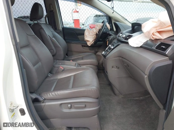 2013 Honda Odyssey Touring with VIN 5FNRL5H96DB089336, listed as a IAAI auction lot 41527990 with 128,770 mi miles. Bid and sale history available at carsss.com. Image 5.