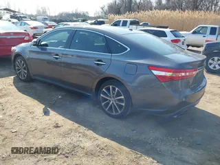 2015 Toyota Avalon Limited with VIN 4T1BK1EB4FU187338, listed as a IAAI auction lot 41696526 with 101,258 mi miles and . Bid and sale history available at DreamBid. Image 3.