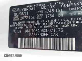 2012 Hyundai Veloster w/Gray Int with VIN KMHTC6AD6CU021176, listed as a IAAI auction lot 42205695 with 93,665 mi miles and . Bid and sale history available at DreamBid. Image 9.