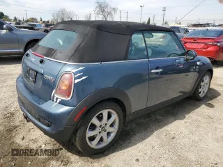 2010 MINI Convertible S with VIN WMWMS3C5XATY51076, listed as a Copart auction lot 48532735 with 104,901 mi miles and Clean title. Bid and sale history available at DreamBid. Image 3.
