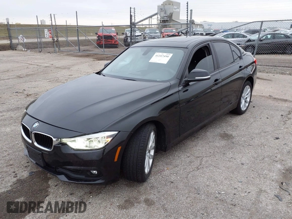 2018 BMW 3 Series 320i with VIN WBA8E1G56JNU91008, listed as a IAAI auction lot 41247490 with 57,434 mi miles. Bid and sale history available at carsss.com. Image 2.