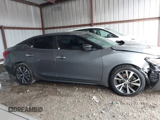 2018 Nissan Maxima Platinum z VIN 1N4AA6AP4JC390235, wystawiony jako IAAI lot #42376364 z przebiegiem 152 293 mil mil oraz . Historia ofert i sprzedaży dostępna na DreamBid. Obrazek 13.