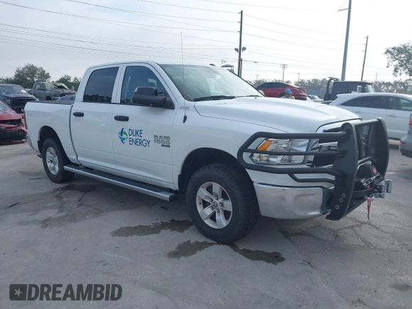 2022 Ram 1500 Tradesman with VIN 3C6RR7KG4NG331979, listed as a IAAI auction lot 41447852 with 14,201 mi miles and . Bid and sale history available at DreamBid. Image 1.