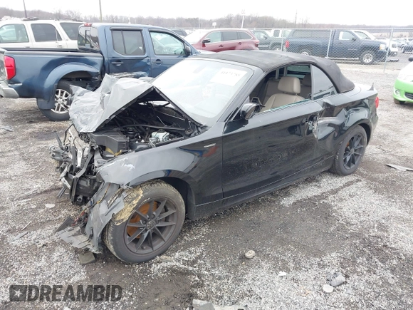 2011 BMW 1 Series 128i with VIN WBAUN1C5XBVH82457, listed as a IAAI auction lot 41173785 with Not provided miles and . Bid and sale history available at DreamBid. Image 17.