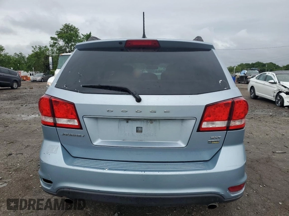 2013 Dodge Journey SXT with VIN 3C4PDCBG0DT619382, listed as a Copart auction lot 56565205 with 176,112 mi miles and Salvage title. Bid and sale history available at DreamBid. Image 6.