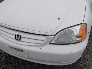 2002 Honda Civic EX with VIN 1HGES26702L074649, listed as a IAAI auction lot 40975048 with 151,975 mi miles and . Bid and sale history available at carsss.com. Image 6.