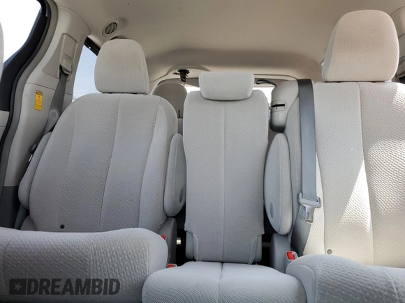 2014 Toyota Sienna LE AAS with VIN 5TDKK3DC1ES504232, listed as a Copart auction lot 54169005 with 103,724 mi miles and Salvage Title. Bid and sale history available at DreamBid. Image 10.