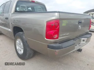 2006 Dodge Dakota SLT with VIN 1D7HE48N16S703072, listed as a IAAI auction lot 42156709 with 102,919 mi miles. Bid and sale history available at carsss.com. Image 6.