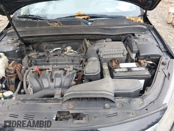2013 Kia Optima EX with VIN 5XXGN4A7XDG230054, listed as a IAAI auction lot 40856801 with 235,368 mi miles. Bid and sale history available at carsss.com. Image 10.